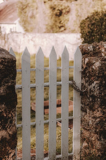caption for Choosing the Right Fence Paint Color to Make Your Garden Look Bigger